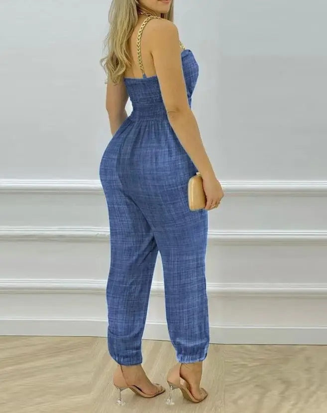 Mocarra | Unifarbener Jumpsuit mit Kettenriemen