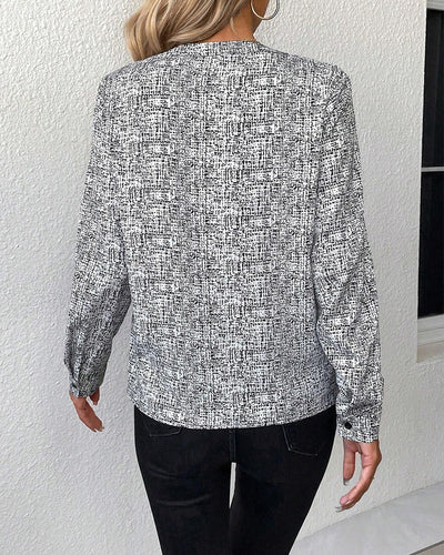 Sheryl - Elegante bedruckte Langarmbluse mit V-Ausschnitt