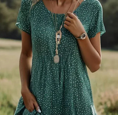 Luz - kurzärmeliges grünes minikleid mit punkten